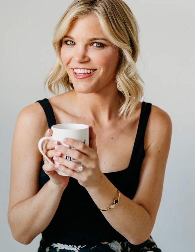 Angela Tait with a cup of coffee